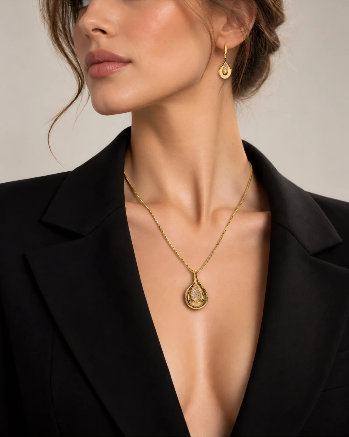 Necklace and earring on a model, after